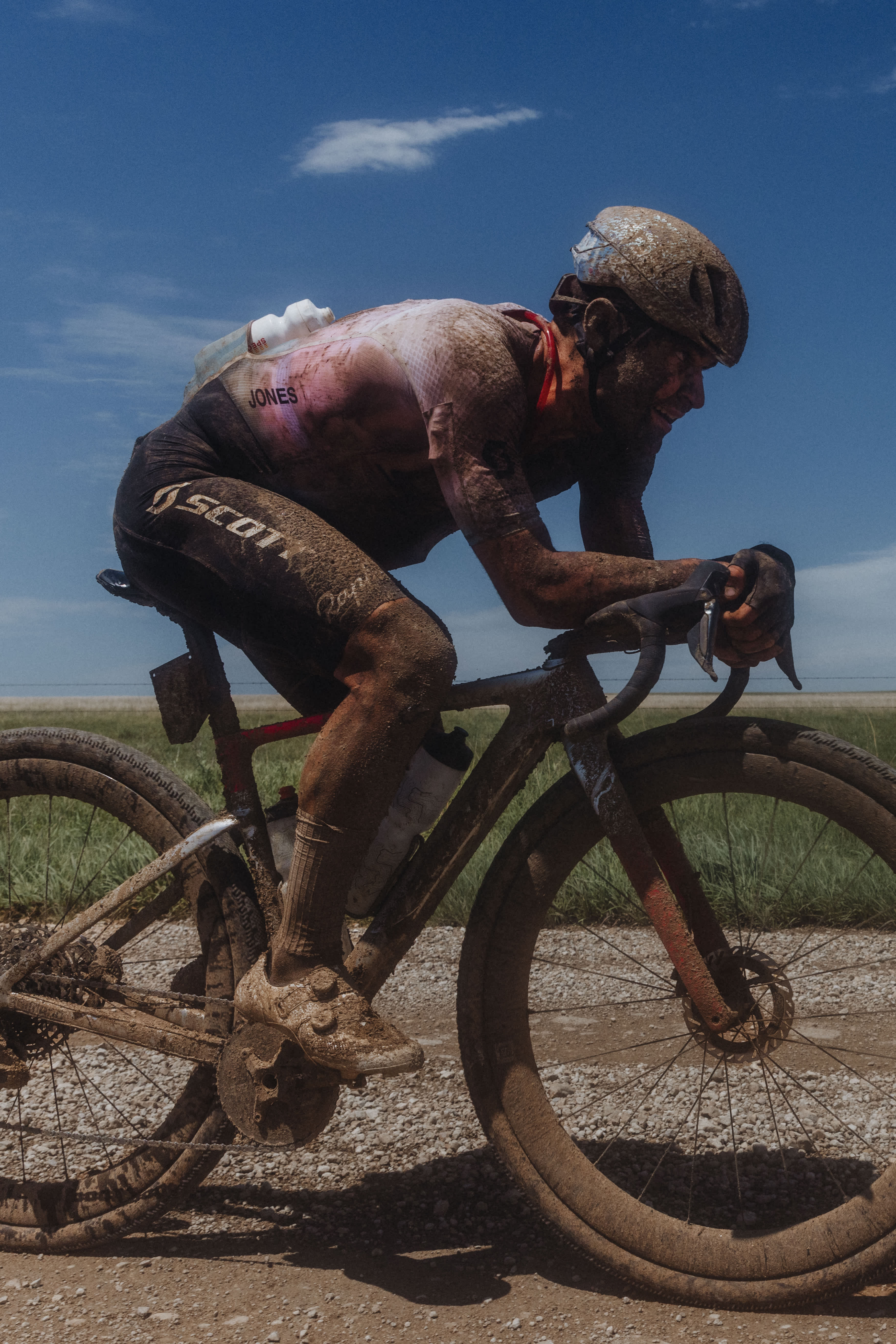 Cam Jones in a muddy mess at Unbound
