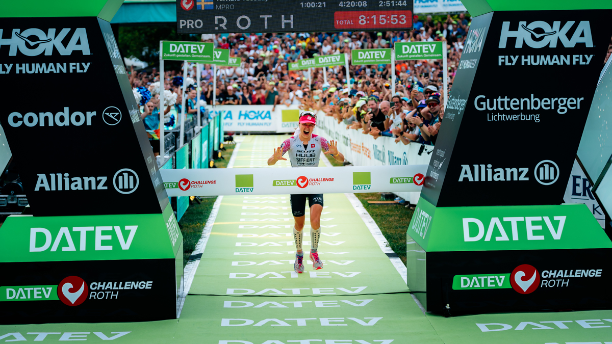 Alanis Siffert crossing the finish line at Challenge Roth 2026